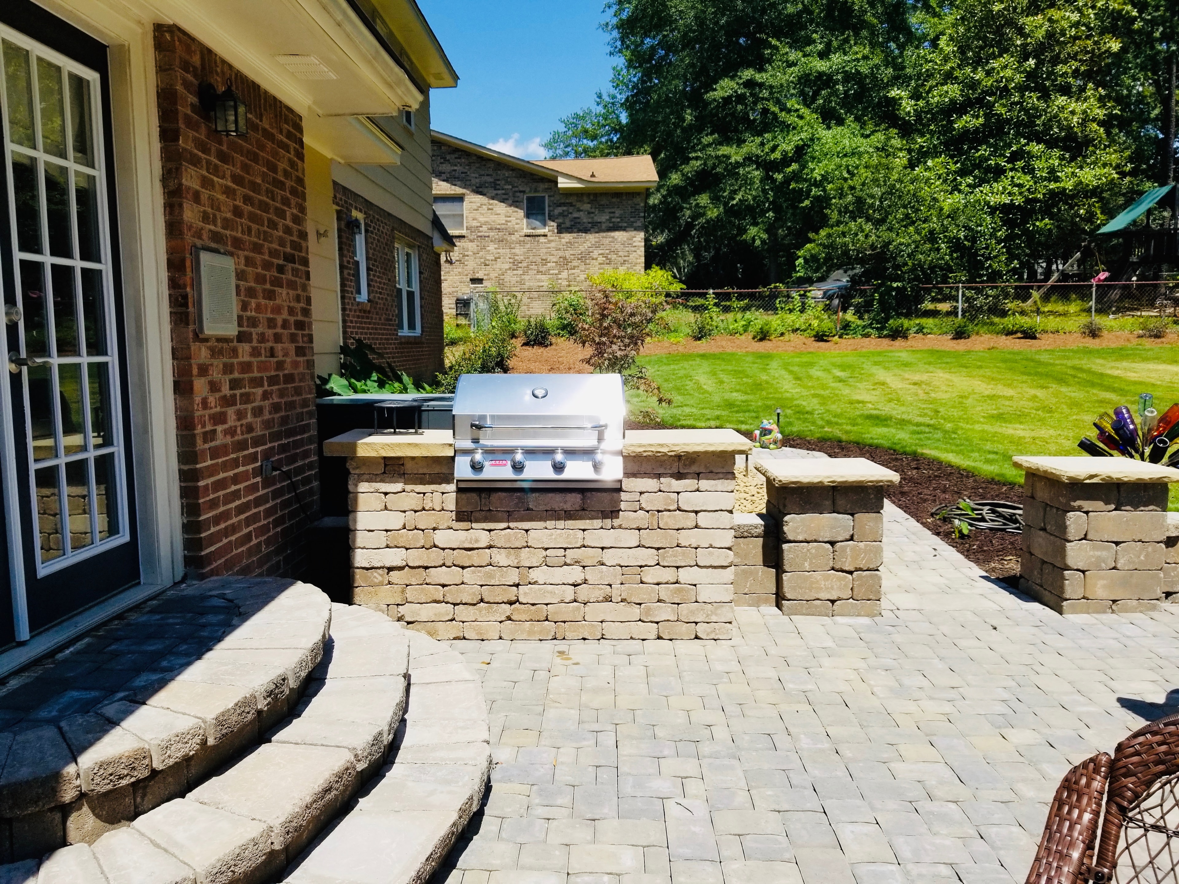 Backyard patio with built-in grill